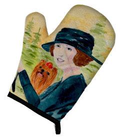 Lady driving with her Yorkie Oven Mitt